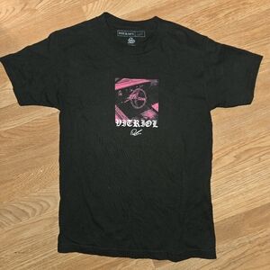Black and Pink Graphic Tee by [Brand]